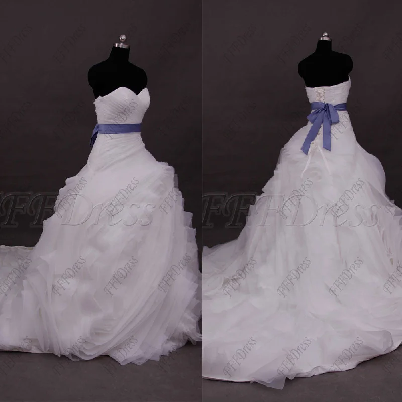 Ball gown swirls wedding dress with blue sash